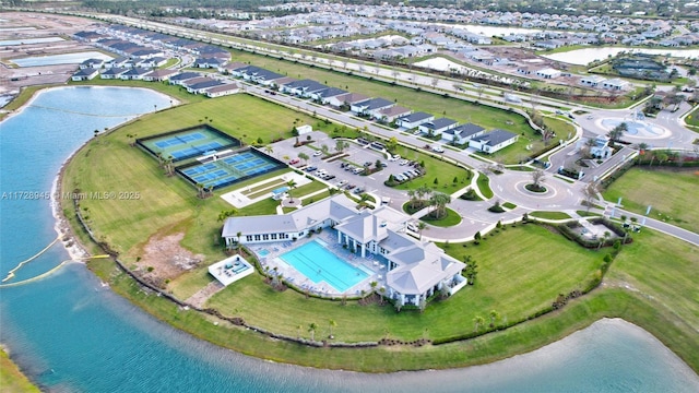 birds eye view of property featuring a water view