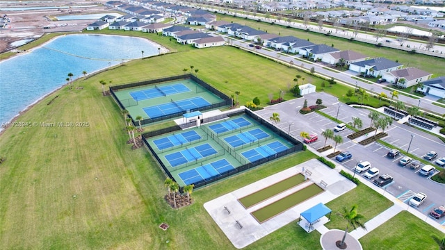 bird's eye view with a water view