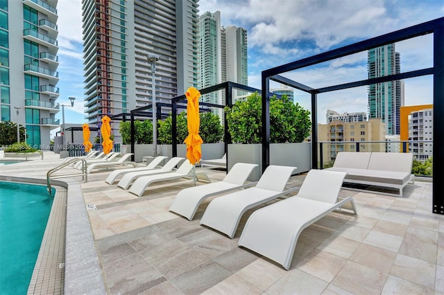 view of patio featuring a community pool