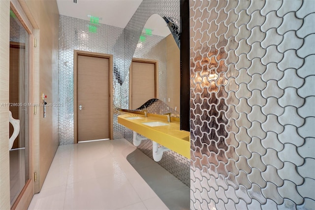 bathroom featuring sink and tile patterned floors