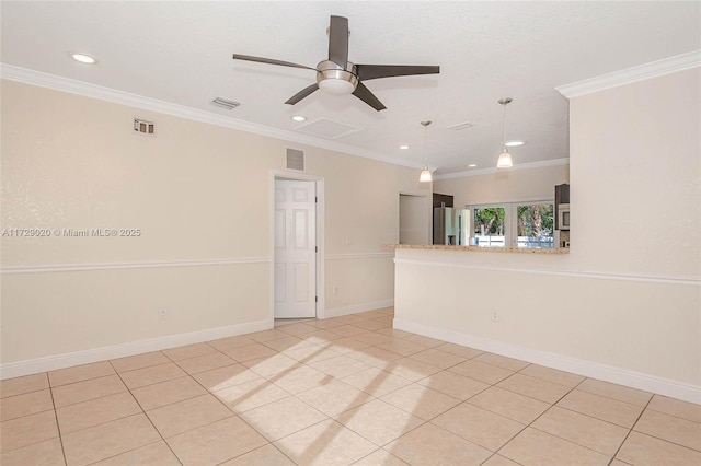 tiled spare room featuring ceiling fan and ornamental molding