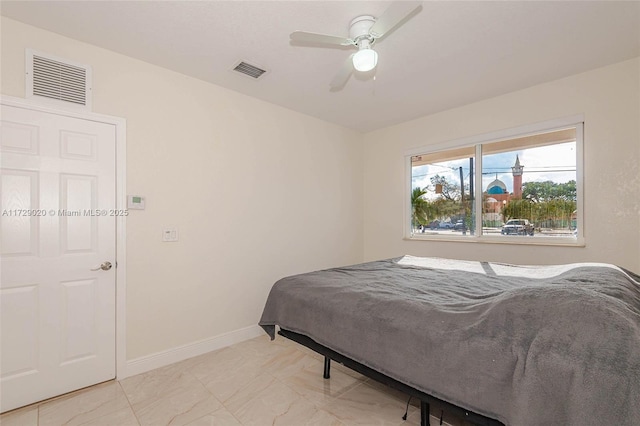 bedroom featuring ceiling fan