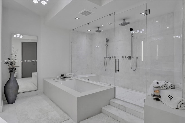 bathroom featuring plus walk in shower