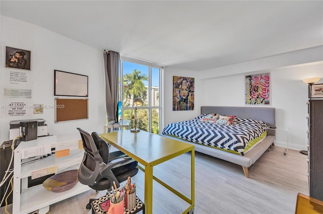 bedroom featuring light hardwood / wood-style flooring