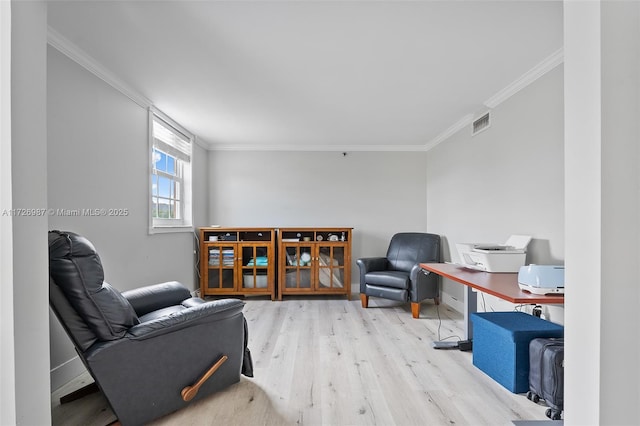 1400 Salzedo St Unit 301, Coral Gables, FL 33134 - sitting room featuring ornamental molding and wood finished floors