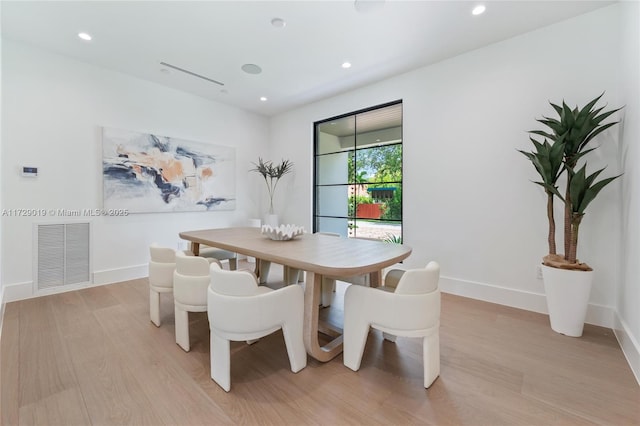 11001 SW 74th Ave, Pinecrest, FL 33156 - dining area with light wood finished floors, baseboards, and recessed lighting