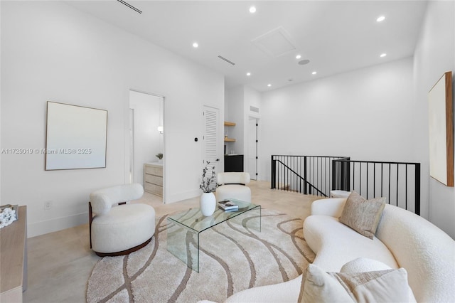 11001 SW 74th Ave, Pinecrest, FL 33156 - living room featuring recessed lighting and concrete flooring