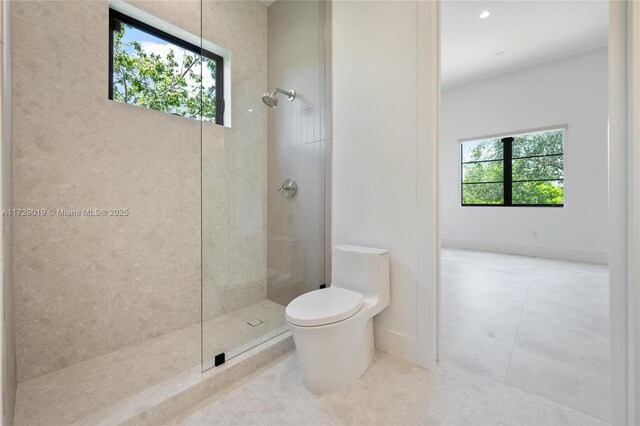 11001 SW 74th Ave, Pinecrest, FL 33156 - bathroom with plenty of natural light, walk in shower, toilet, and tile patterned flooring