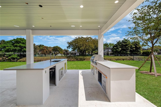 11001 SW 74th Ave, Pinecrest, FL 33156 - view of patio featuring a sink