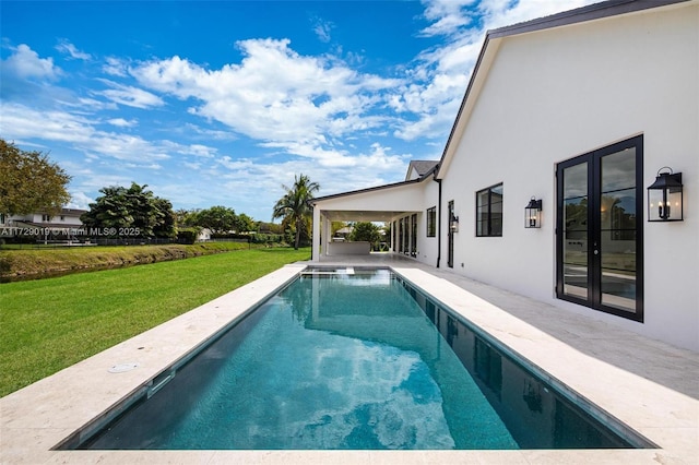 11001 SW 74th Ave, Pinecrest, FL 33156 - swimming pool with a lawn and a patio