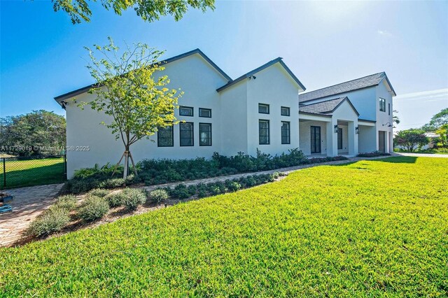 11001 SW 74th Ave, Pinecrest, FL 33156 - view of front facade featuring stucco siding