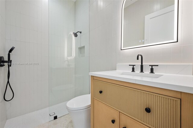 11001 SW 74th Ave, Pinecrest, FL 33156 - full bath with tile walls, vanity, toilet, walk in shower, and tile patterned flooring