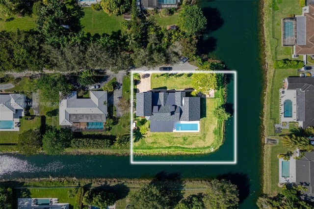 11001 SW 74th Ave, Pinecrest, FL 33156 - aerial view of residential area with property boundaries highlighted and a large body of water