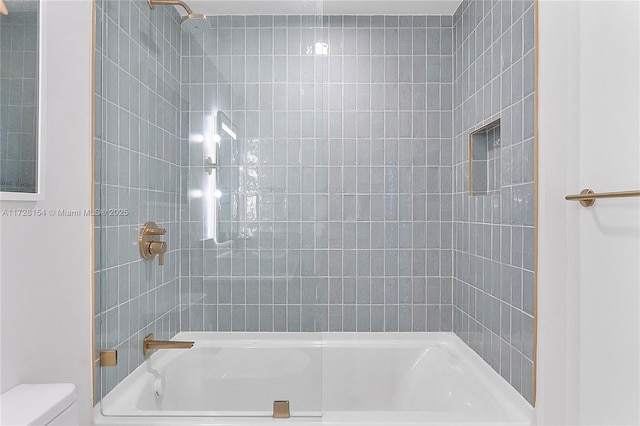 bathroom with toilet and shower / washtub combination