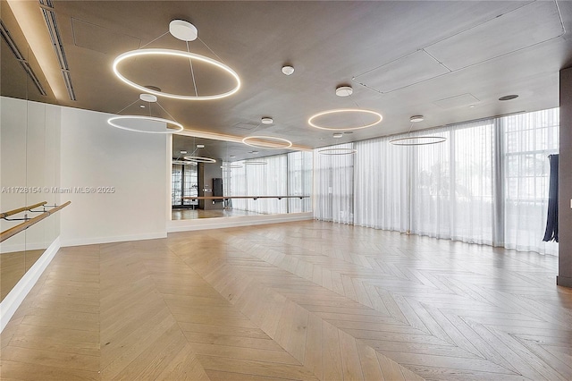 empty room featuring parquet flooring