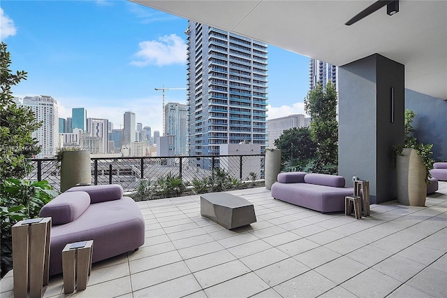 view of patio / terrace featuring ceiling fan and outdoor lounge area