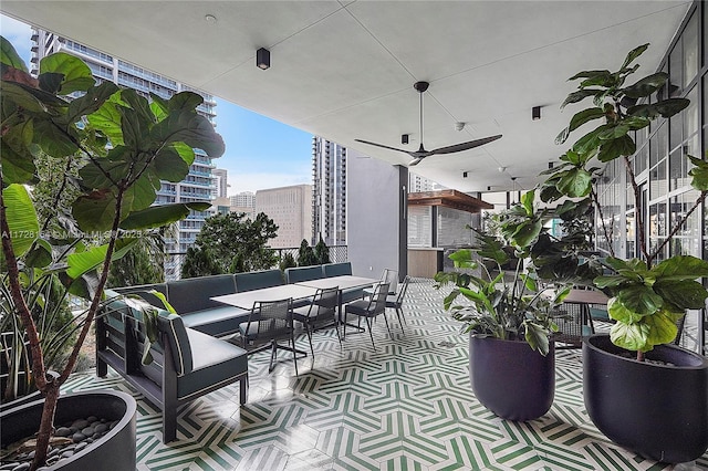 view of patio / terrace featuring an outdoor living space and ceiling fan