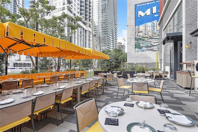 view of patio featuring an outdoor bar