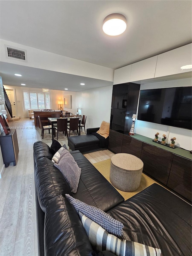 living room featuring hardwood / wood-style floors