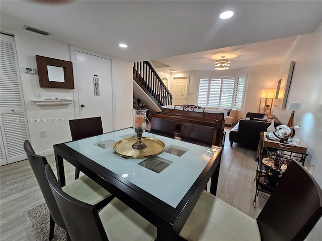 dining room with light wood-type flooring