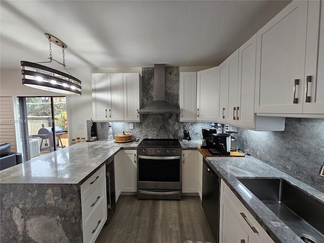 kitchen with dishwasher, sink, white cabinets, wall chimney exhaust hood, and electric stove