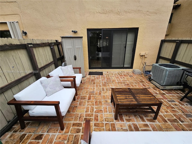 view of patio with central AC