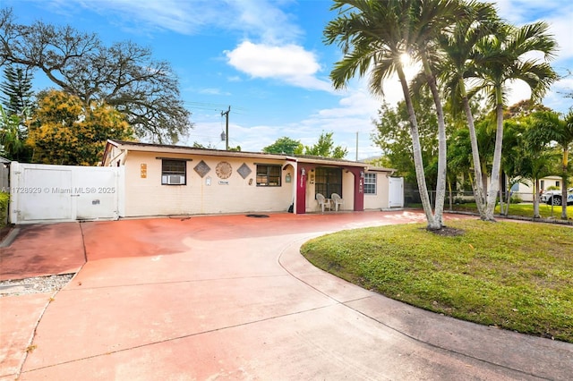 view of front of home with a front lawn