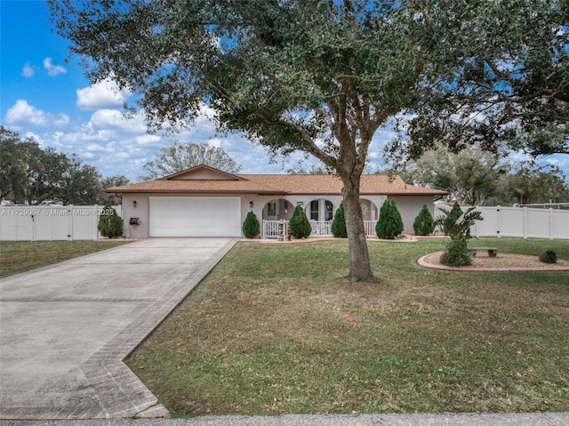 single story home with a front lawn and a garage