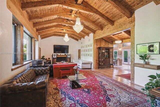 living area featuring wooden ceiling, wood finished floors, beamed ceiling, and high vaulted ceiling