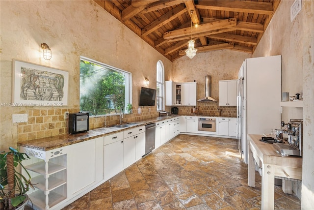 kitchen with wood ceiling, stainless steel appliances, open shelves, a sink, and high vaulted ceiling