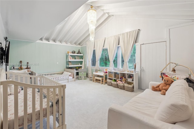 bedroom featuring vaulted ceiling with beams and carpet floors