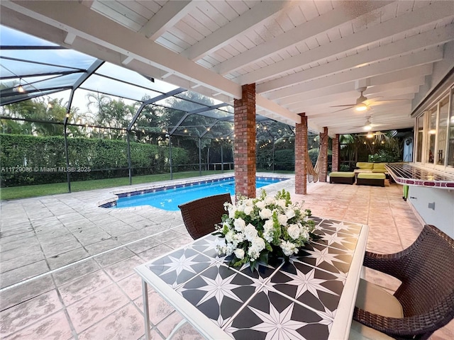 view of pool with a lanai, outdoor lounge area, and a patio area