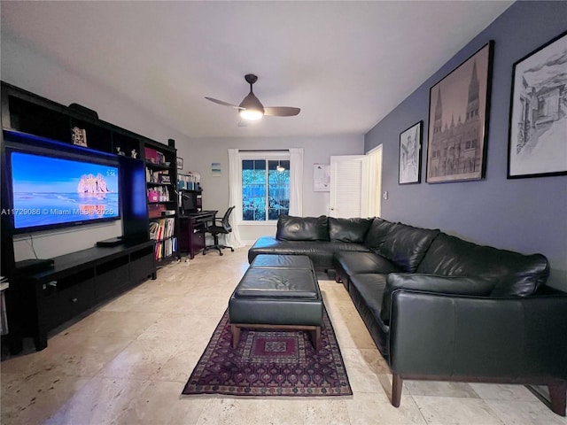 living room featuring ceiling fan