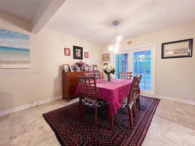 dining room with a chandelier