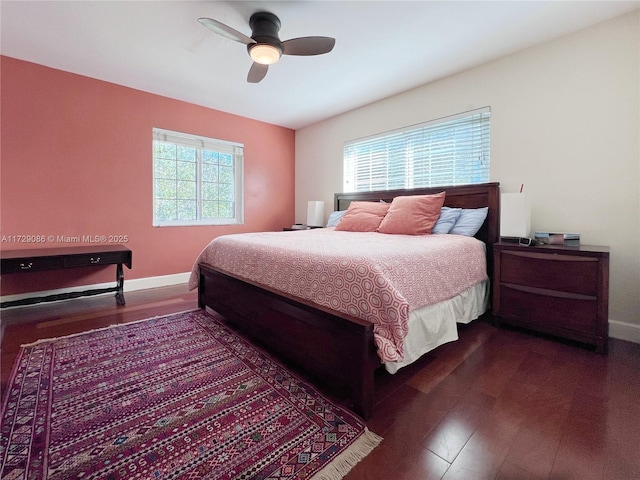 bedroom with wood-type flooring and ceiling fan