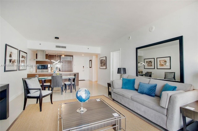 living room featuring light tile patterned floors