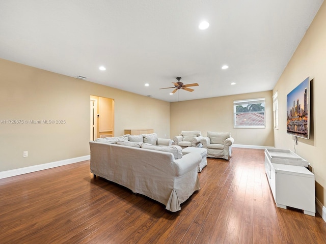 living room with hardwood / wood-style floors, recessed lighting, a ceiling fan, and baseboards