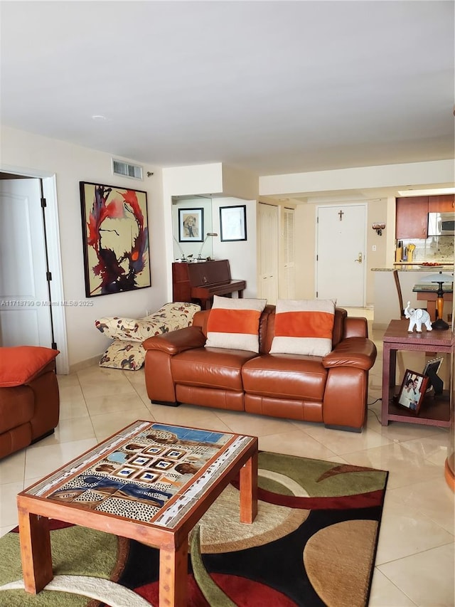 living room featuring tile patterned floors