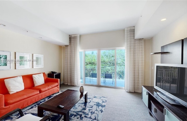 living room with light colored carpet