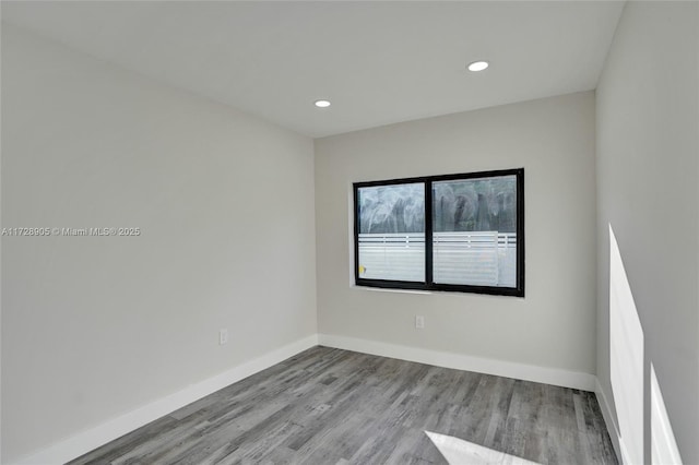 unfurnished room featuring light wood-type flooring