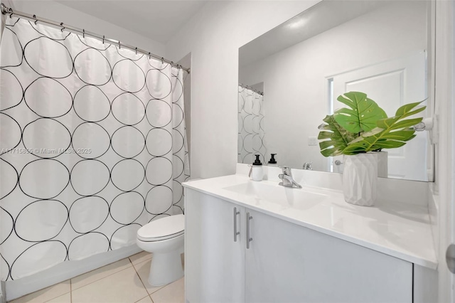 bathroom with toilet, vanity, a shower with curtain, and tile patterned flooring