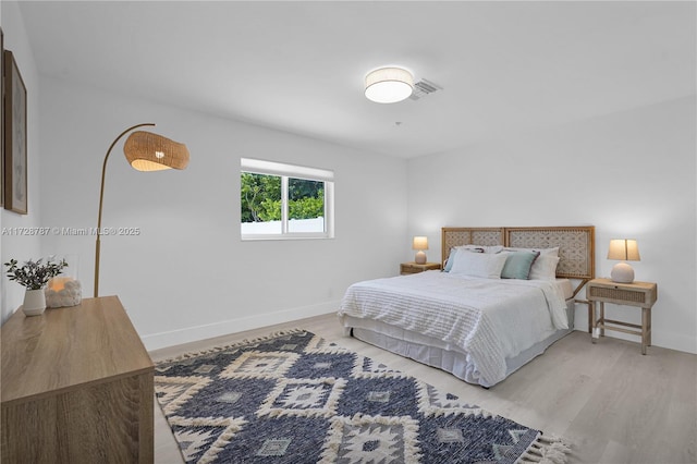 bedroom featuring light wood-type flooring