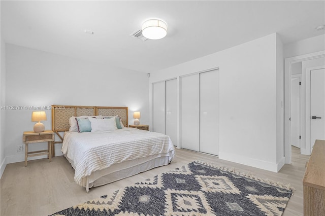 bedroom featuring light hardwood / wood-style flooring