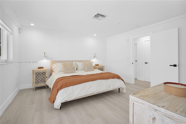 bedroom with crown molding and light wood-type flooring