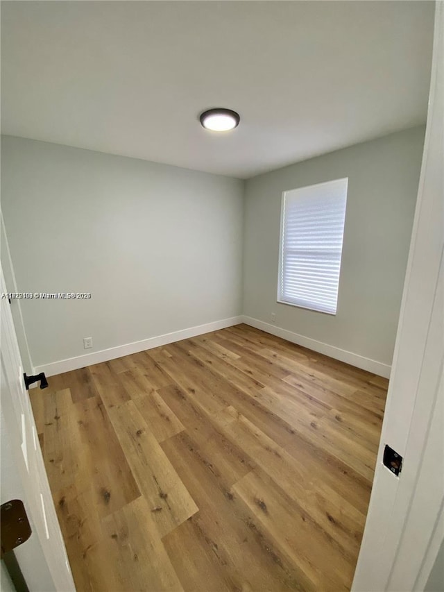 empty room featuring light hardwood / wood-style floors