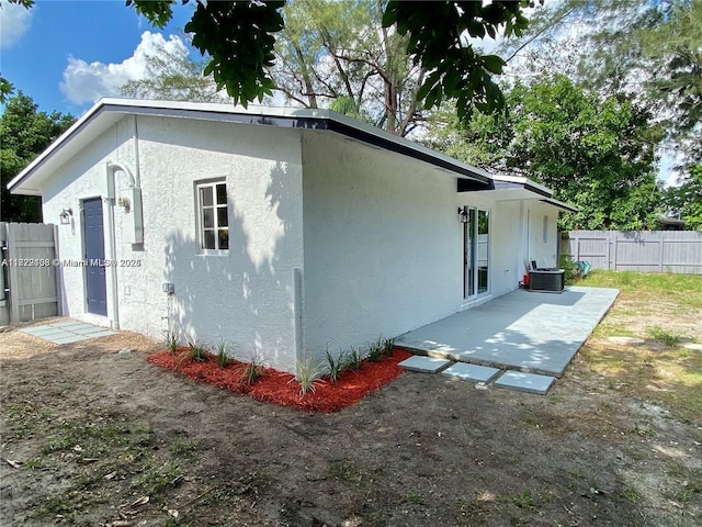 view of property exterior featuring a patio