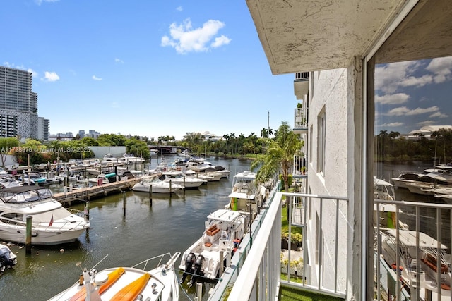 balcony featuring a water view