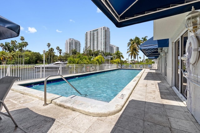 view of pool featuring a patio area