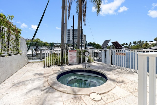 view of patio / terrace with a community hot tub