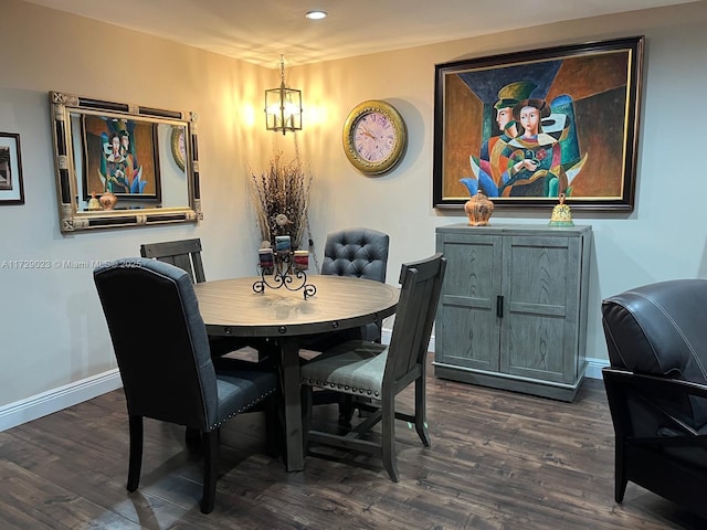 dining space with recessed lighting, a notable chandelier, dark wood-style floors, and baseboards
